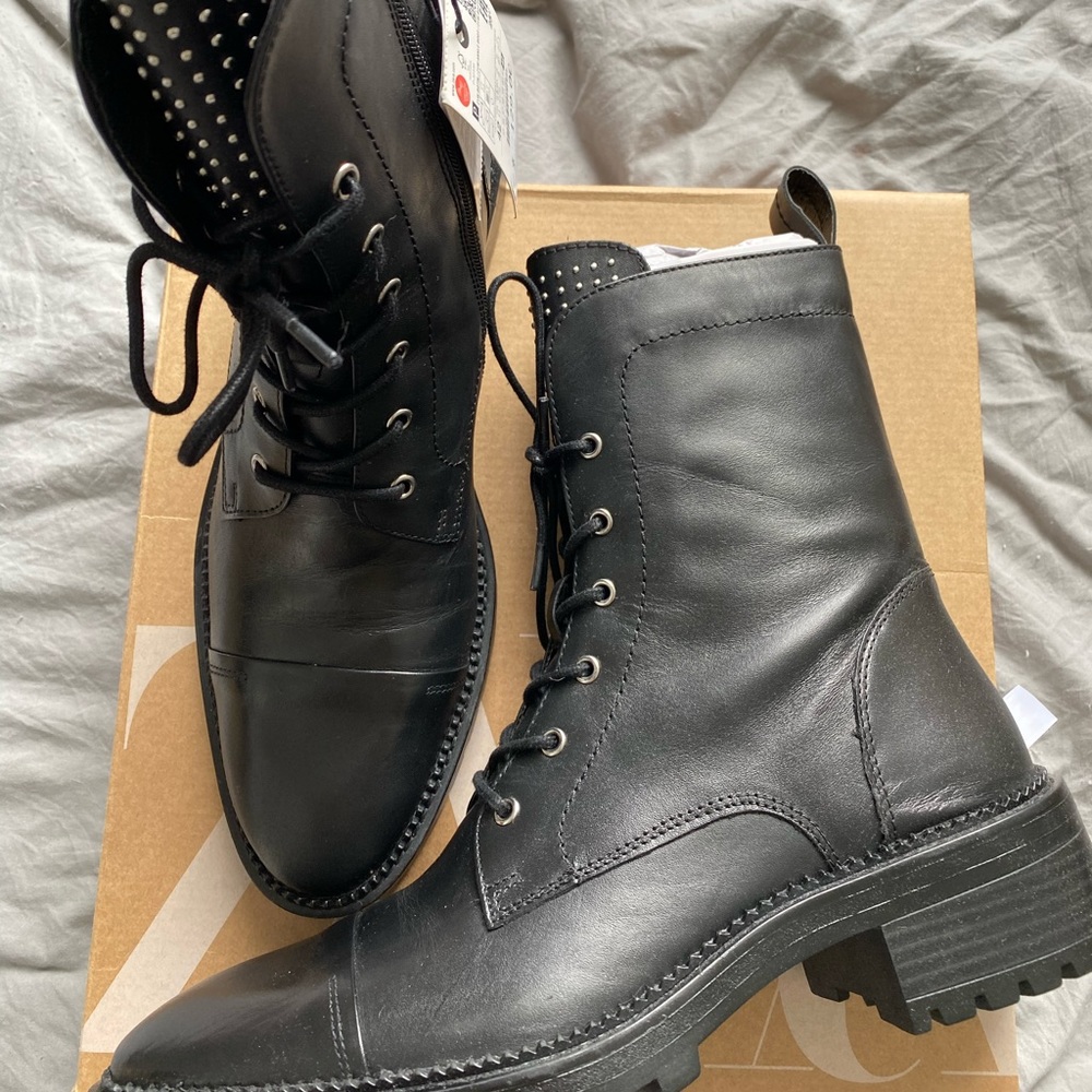 Studded low-heeled leather ankle boots